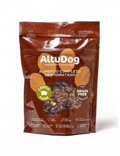 Comida deshidratada para perros  sin cereales, con carne de cerdo, verdura, fruta y vísceras.