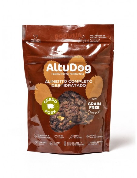 Comida deshidratada para perros  sin cereales, con carne de cerdo, verdura, fruta y vísceras.